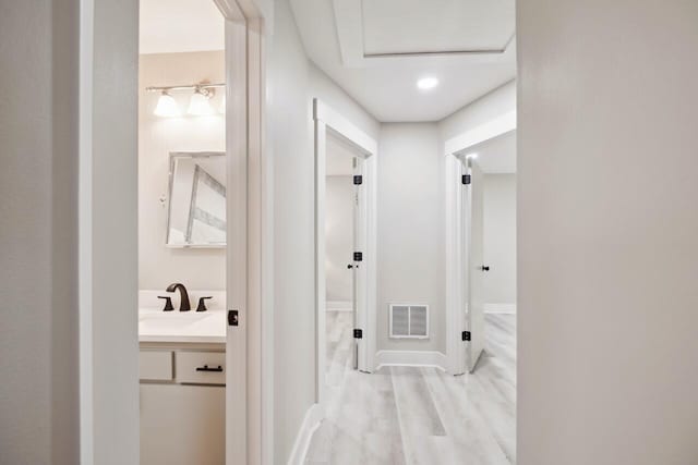 1161 Monaco Dr, Mount Pleasant, SC 29464 - hall featuring light wood-style floors and attic access