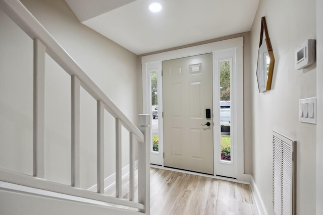 1161 Monaco Dr, Mount Pleasant, SC 29464 - foyer with light wood-style flooring and stairs