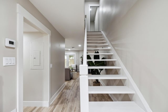 1161 Monaco Dr, Mount Pleasant, SC 29464 - staircase with wood finished floors, recessed lighting, and electric panel