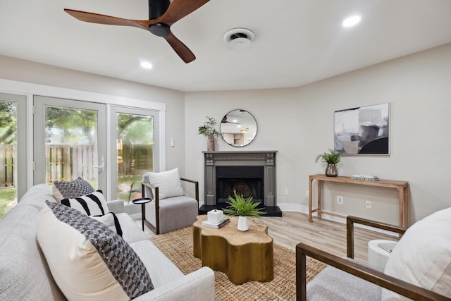 1161 Monaco Dr, Mount Pleasant, SC 29464 - living room featuring wood finished floors, a ceiling fan, recessed lighting, and a fireplace