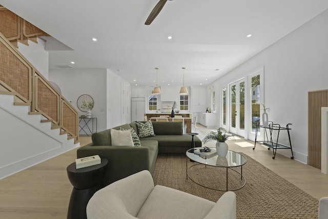 755 Adluh St, Mount Pleasant, SC 29464 - living room featuring stairs, recessed lighting, visible vents, and light wood-type flooring