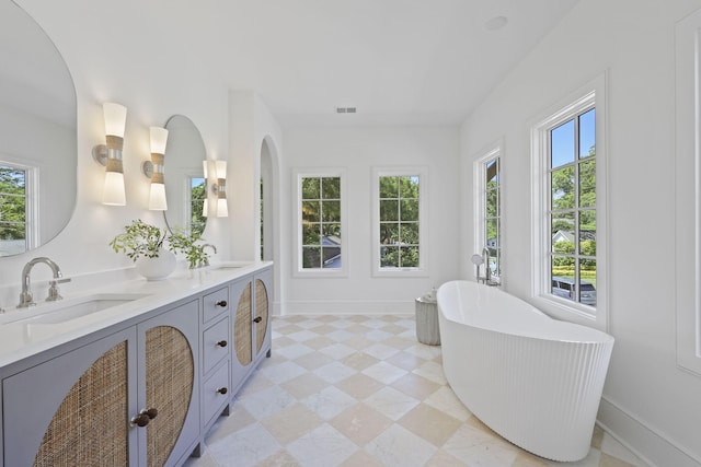 755 Adluh St, Mount Pleasant, SC 29464 - bathroom featuring double vanity, a sink, and a wealth of natural light
