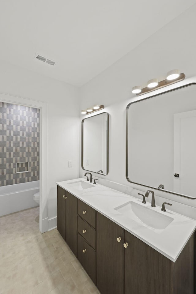 755 Adluh St, Mount Pleasant, SC 29464 - full bathroom with a sink, toilet, double vanity, and visible vents