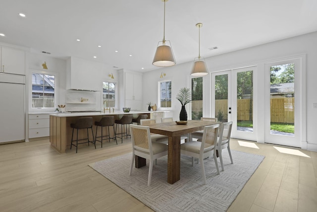 755 Adluh St, Mount Pleasant, SC 29464 - dining space featuring french doors, recessed lighting, light wood-style floors, and a wealth of natural light