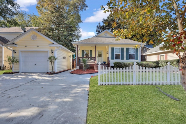 view of front facade with a garage, covered porch, and a front yard