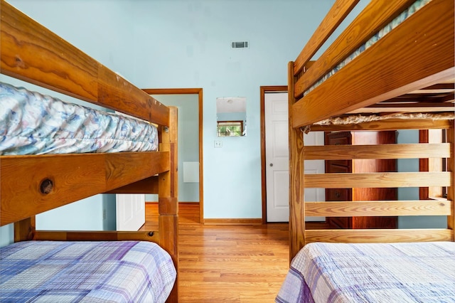 209 Jungle Rd, Edisto Beach, SC 29438 - bedroom featuring wood finished floors and baseboards