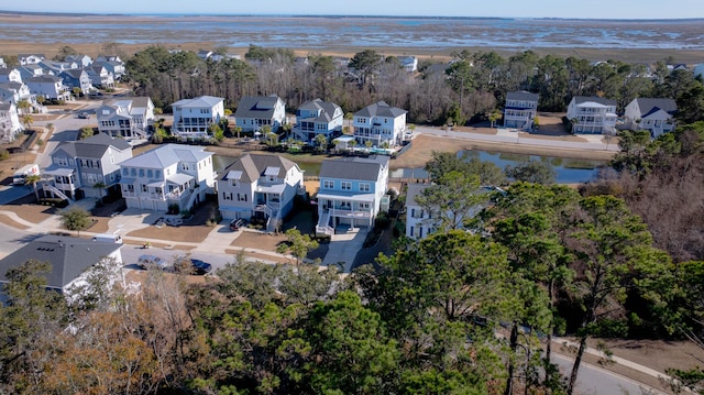 birds eye view of property with a residential view