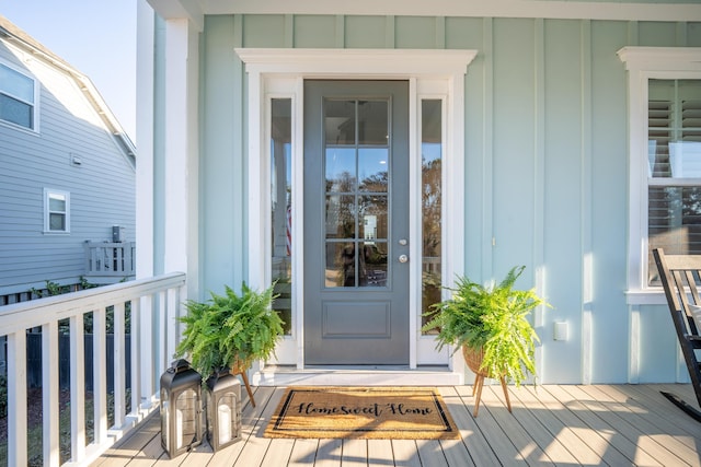 property entrance with board and batten siding