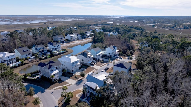 aerial view with a residential view and a water view