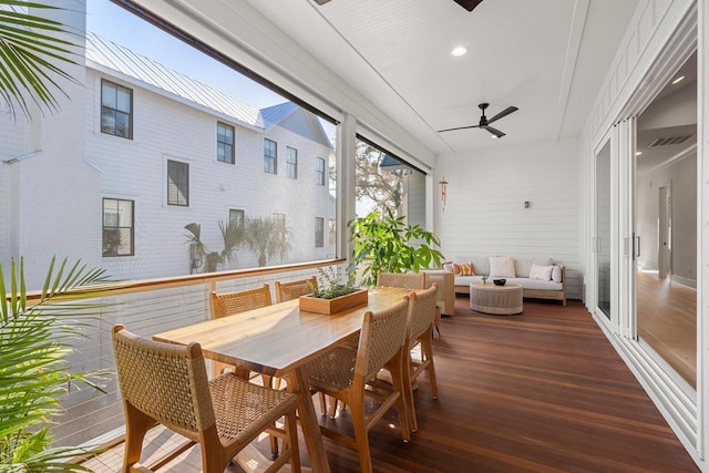 deck featuring an outdoor living space, outdoor dining area, visible vents, and ceiling fan