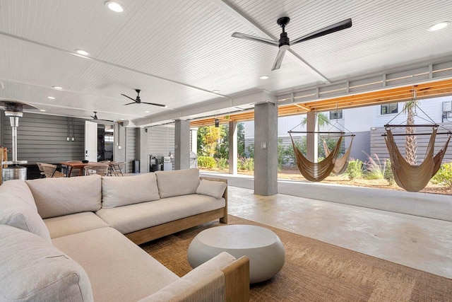 interior space with recessed lighting, concrete flooring, and ceiling fan