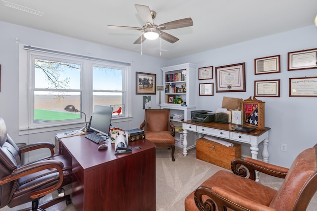 office area featuring carpet and ceiling fan