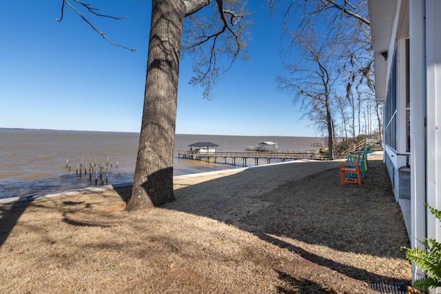 exterior space with a water view