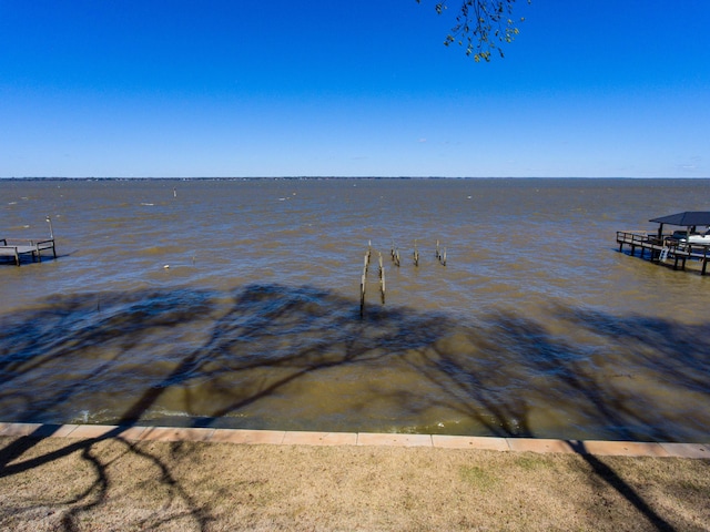 view of dock with a water view