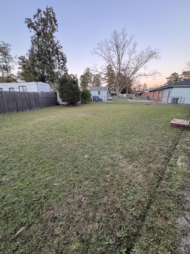 yard at dusk with fence