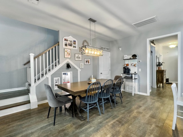 dining room featuring dark hardwood / wood-style floors