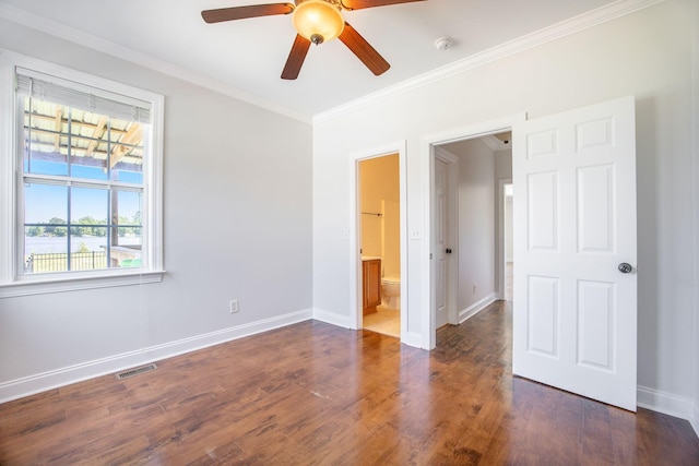 1713 Pimlico Blvd, Moncks Corner, SC 29461 - unfurnished bedroom with crown molding, baseboards, dark wood-style flooring, ensuite bath, and ceiling fan