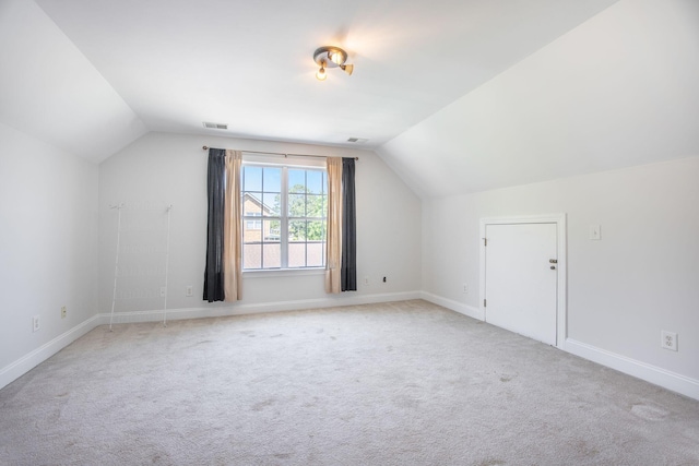1713 Pimlico Blvd, Moncks Corner, SC 29461 - additional living space with lofted ceiling, light colored carpet, and baseboards