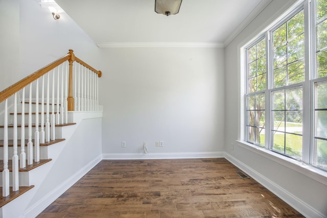 1713 Pimlico Blvd, Moncks Corner, SC 29461 - unfurnished room with stairs, dark wood-style floors, ornamental molding, and baseboards