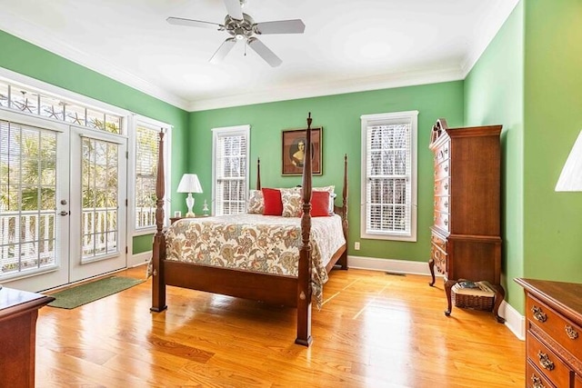 bedroom with access to outside, ornamental molding, and light wood-style flooring