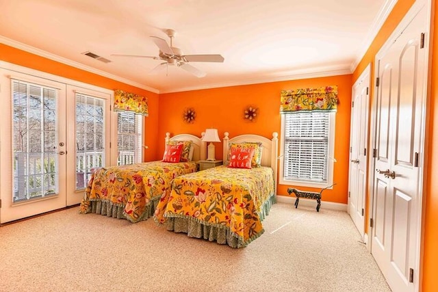 carpeted bedroom with access to exterior, baseboards, visible vents, and crown molding