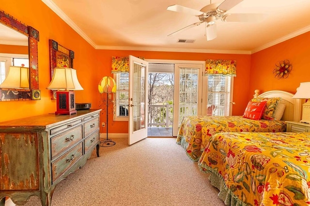 bedroom featuring access to exterior, crown molding, visible vents, a ceiling fan, and carpet flooring