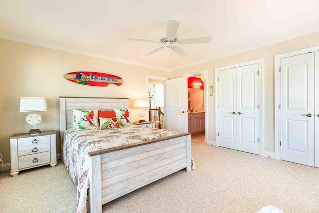 bedroom featuring ornamental molding, light colored carpet, baseboards, and a ceiling fan