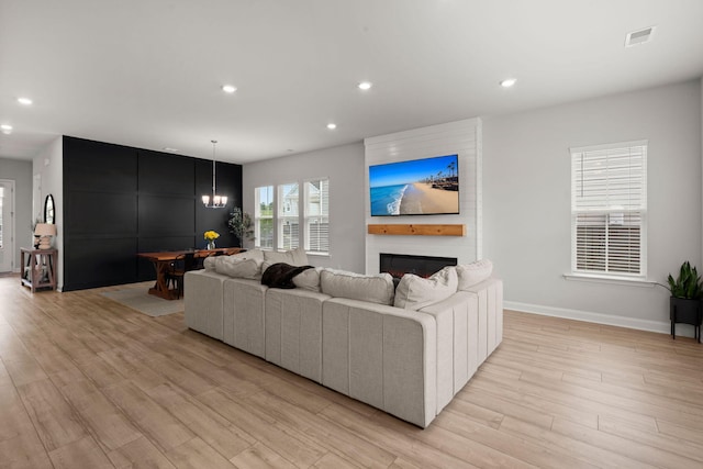 238 Bird Song Path, Summerville, SC 29485 - living area featuring a chandelier, light wood-type flooring, recessed lighting, baseboards, and a large fireplace
