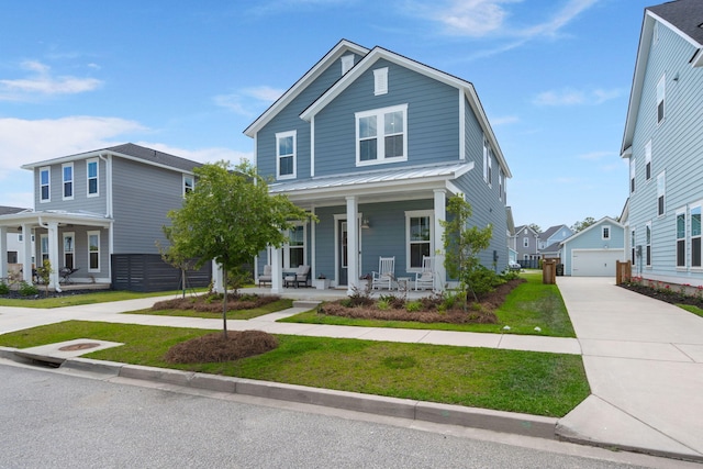 238 Bird Song Path, Summerville, SC 29485 - view of front facade featuring a porch, a front lawn, and a garage