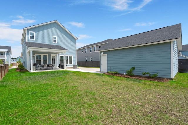 238 Bird Song Path, Summerville, SC 29485 - back of property with a patio and roof with shingles