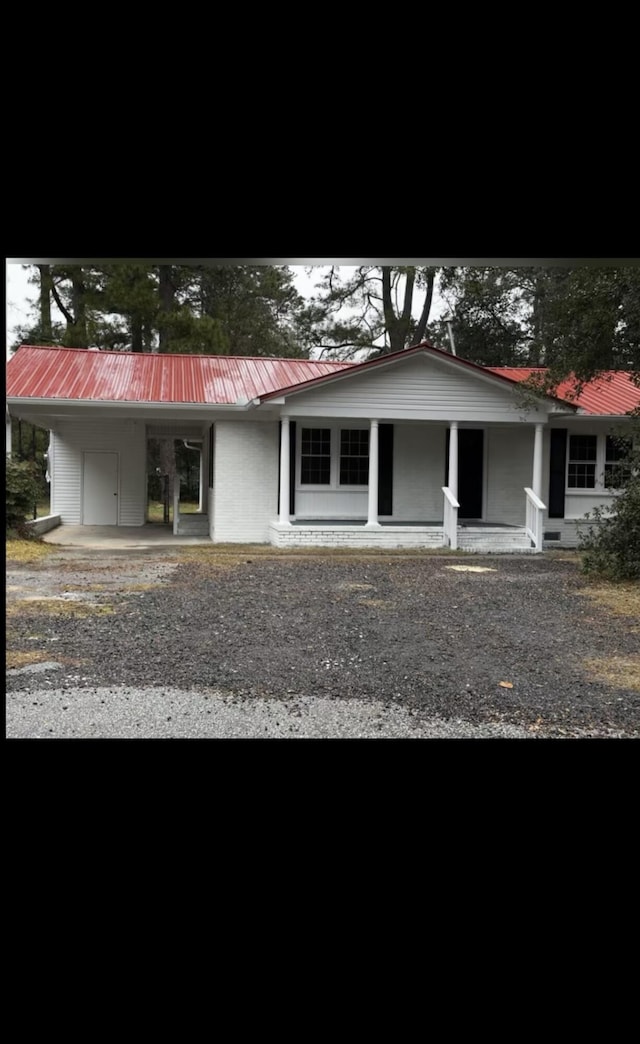 view of front of home with metal roof