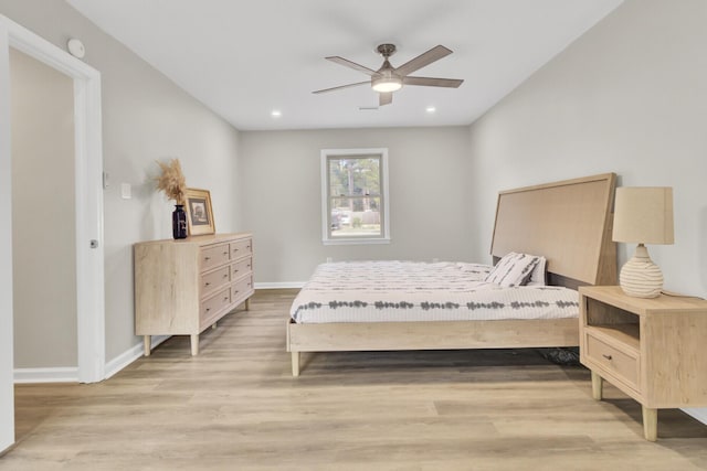 bedroom featuring a ceiling fan, light wood-type flooring, baseboards, and recessed lighting