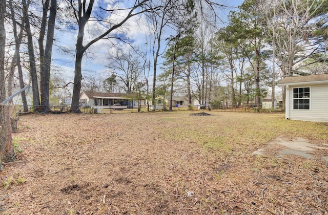 view of yard featuring fence