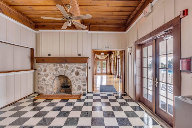 unfurnished living room with french doors, wood ceiling, and a wealth of natural light