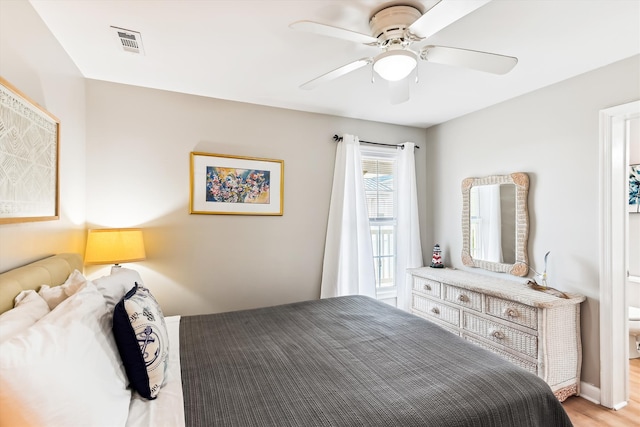 bedroom featuring ceiling fan and light hardwood / wood-style flooring