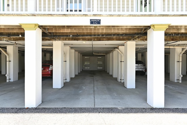 garage featuring a carport