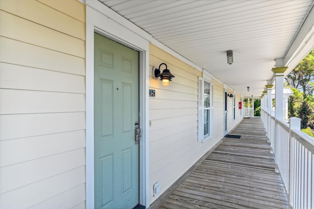 entrance to property featuring a porch