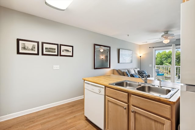 kitchen featuring sink, light hardwood / wood-style flooring, white appliances, and ceiling fan