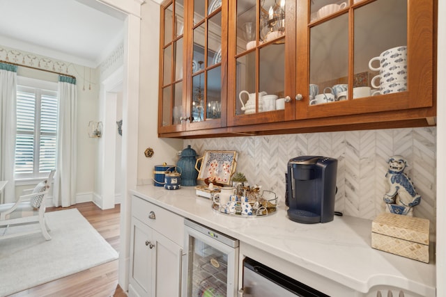 28 Robert Mills Cir, Mount Pleasant, SC 29464 - bar with wine cooler, decorative backsplash, light wood-style flooring, and baseboards