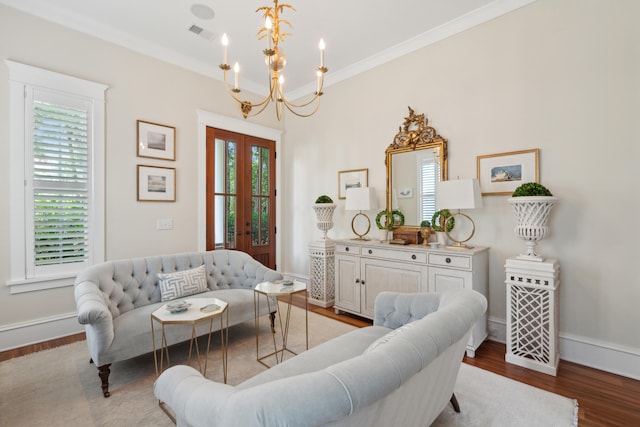 28 Robert Mills Cir, Mount Pleasant, SC 29464 - living area featuring a chandelier, wood finished floors, french doors, baseboards, and crown molding