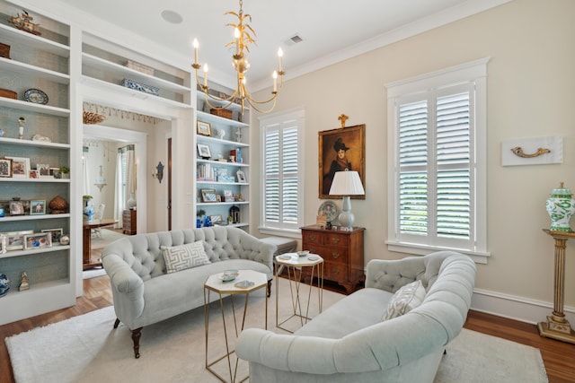 28 Robert Mills Cir, Mount Pleasant, SC 29464 - living room featuring a chandelier, wood finished floors, ornamental molding, and baseboards