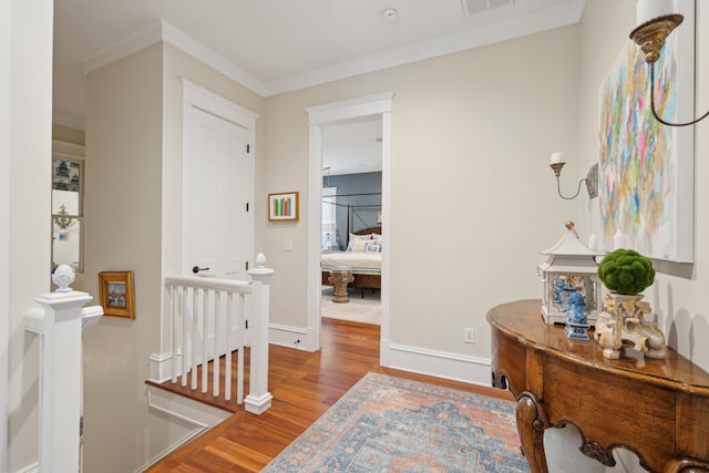 28 Robert Mills Cir, Mount Pleasant, SC 29464 - hallway featuring wood finished floors, ornamental molding, and baseboards
