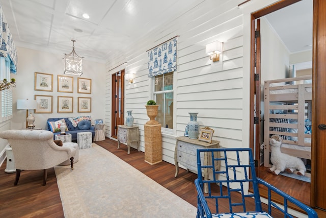 28 Robert Mills Cir, Mount Pleasant, SC 29464 - living room with wood finished floors, ornamental molding, and a chandelier