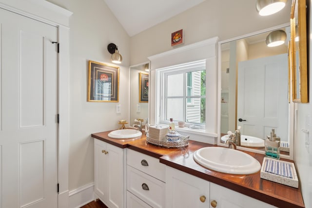 28 Robert Mills Cir, Mount Pleasant, SC 29464 - bathroom featuring double vanity and lofted ceiling