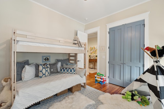 28 Robert Mills Cir, Mount Pleasant, SC 29464 - bedroom with wood finished floors, ornamental molding, and a closet