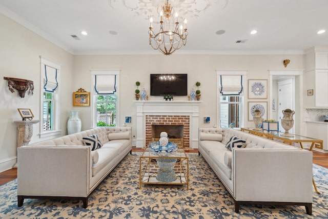 28 Robert Mills Cir, Mount Pleasant, SC 29464 - living room featuring wood finished floors, a chandelier, crown molding, a fireplace, and recessed lighting