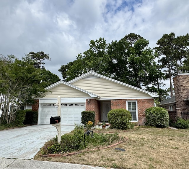 1668 Fairway Place Ln, Mount Pleasant, SC 29464 - single story home featuring a garage, brick siding, concrete driveway, and a front lawn