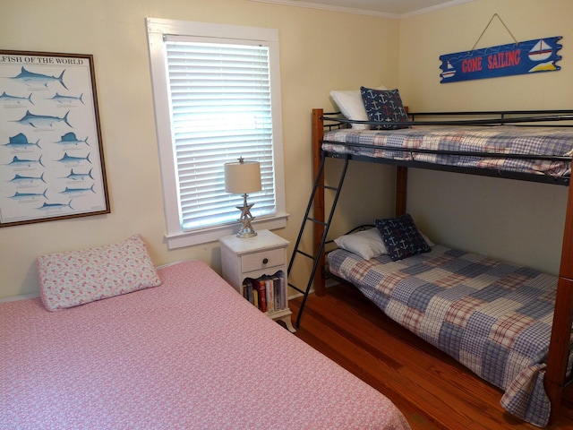 1001 Palmetto Blvd, Edisto Island, SC 29438 - bedroom featuring wood finished floors and ornamental molding