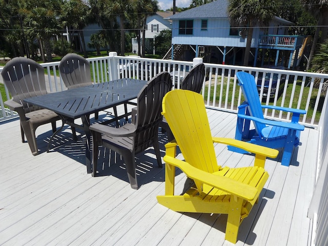1001 Palmetto Blvd, Edisto Island, SC 29438 - deck featuring outdoor dining space and stairway