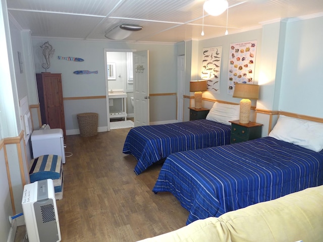 1001 Palmetto Blvd, Edisto Island, SC 29438 - bedroom with wood finished floors, crown molding, and ensuite bath